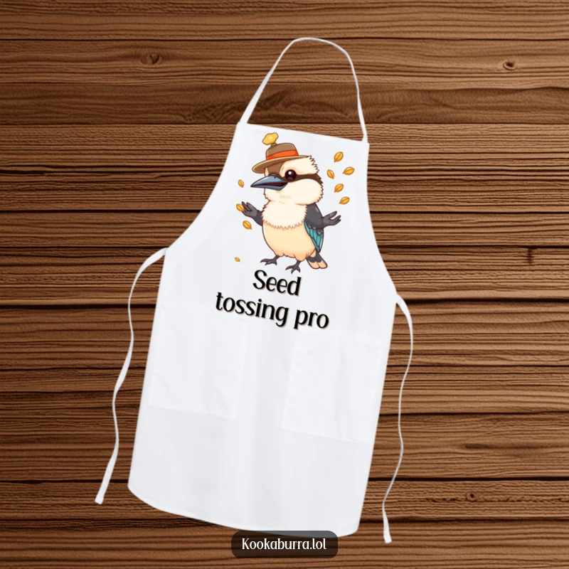 Funny kookaburra apron with a hat-wearing bird, juggling seeds, ideal for a humorous cooking experience.