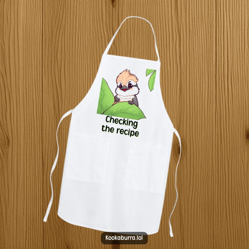 Funny kawaii kookaburra apron showing a cute bird peeking curiously from behind a leaf, perfect for kitchen use with a playful touch.