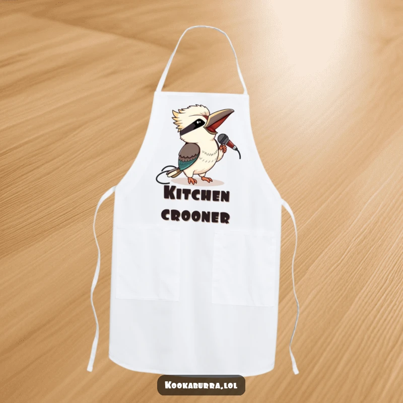 Funny kookaburra apron with a winking bird holding a microphone, great for kitchen performances.