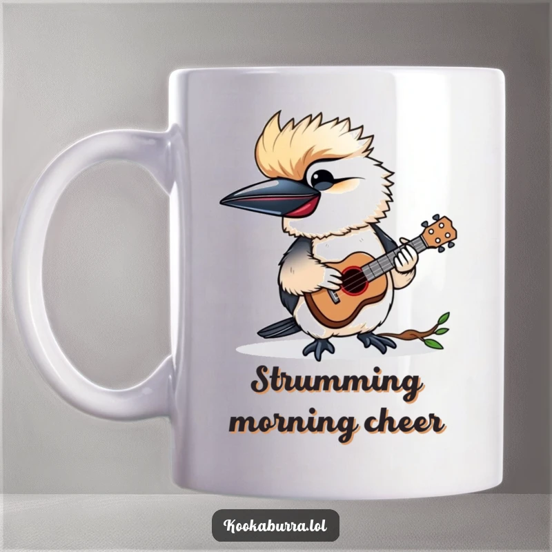 Funny mug showing a kookaburra happily playing a miniature ukulele, radiating cheerful musical vibes and joy.