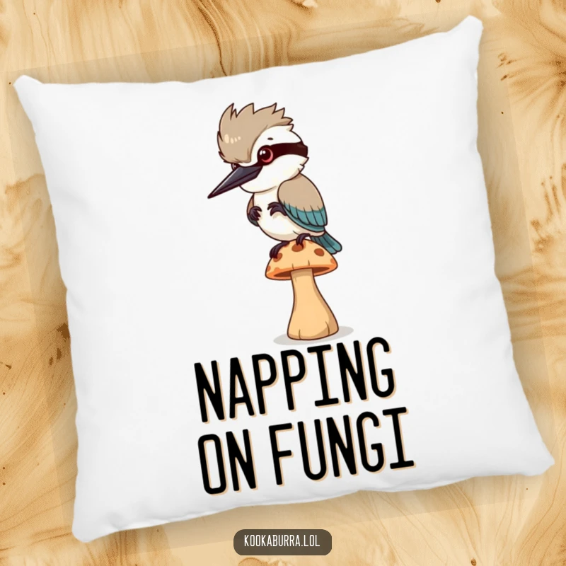 Funny Pillow: A kookaburra bird precariously balances on a small, wobbly mushroom, guaranteed to bring a smile.