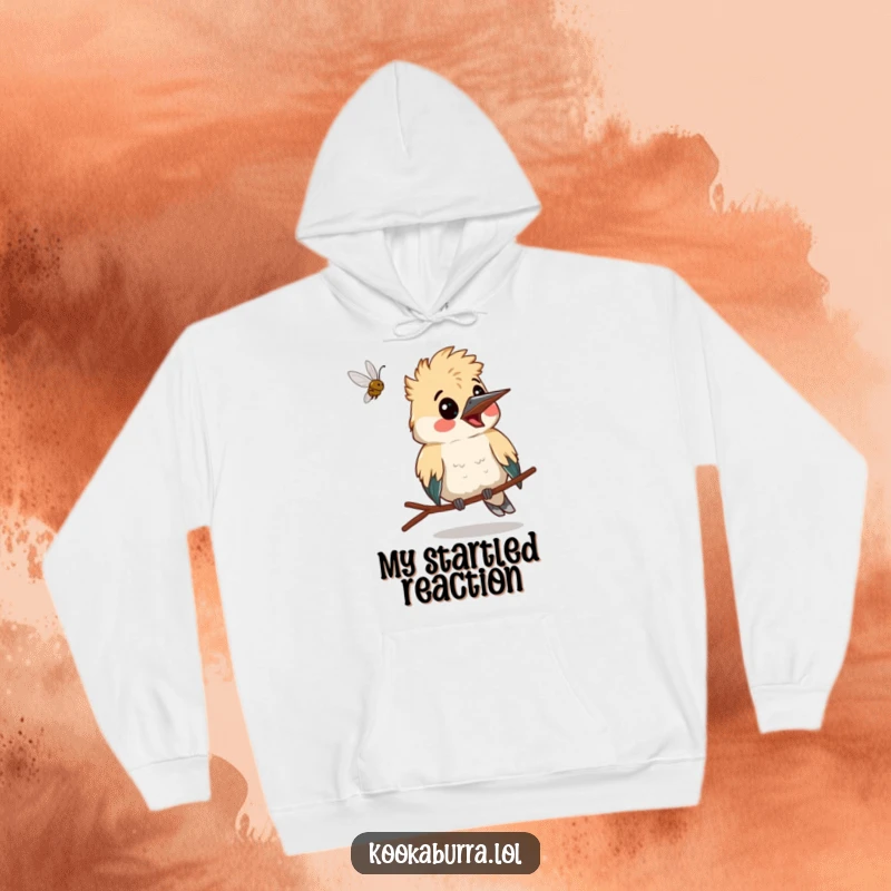 Funny kookaburra making a surprised face as a bug flies past, a warm and humorous hoodie for surprise lovers.