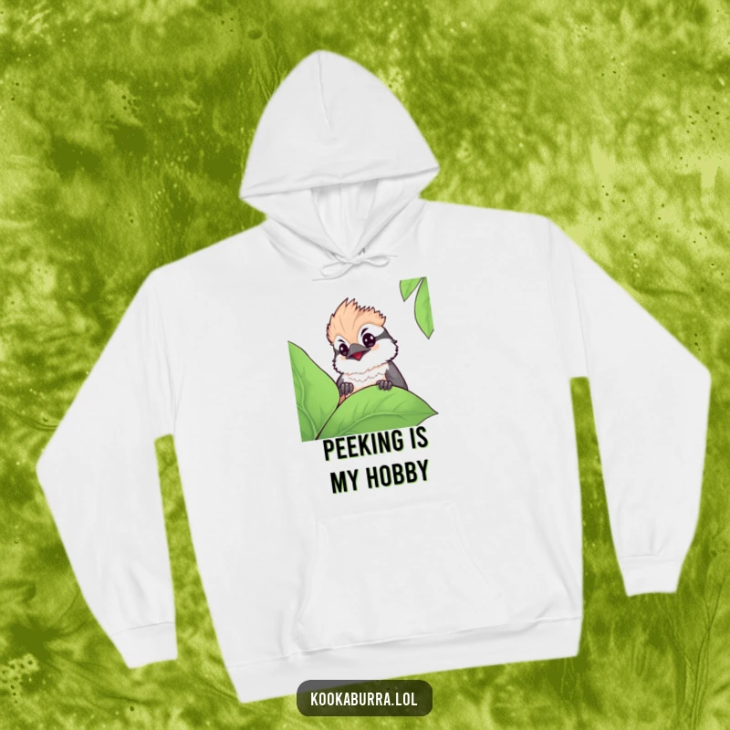 Funny kawaii kookaburra hoodie featuring a sweet bird peeking with curiosity from behind a leaf, ideal for comfort and cuteness.