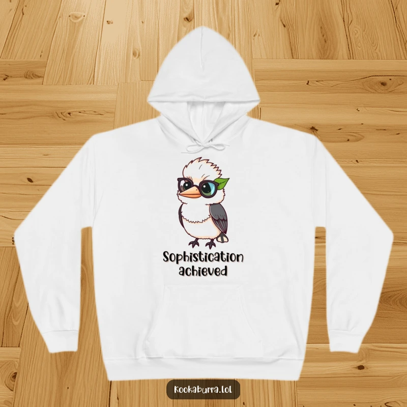 Funny kookaburra comically wearing a leaf as a monocle, adding a touch of class and humor to a hoodie.
