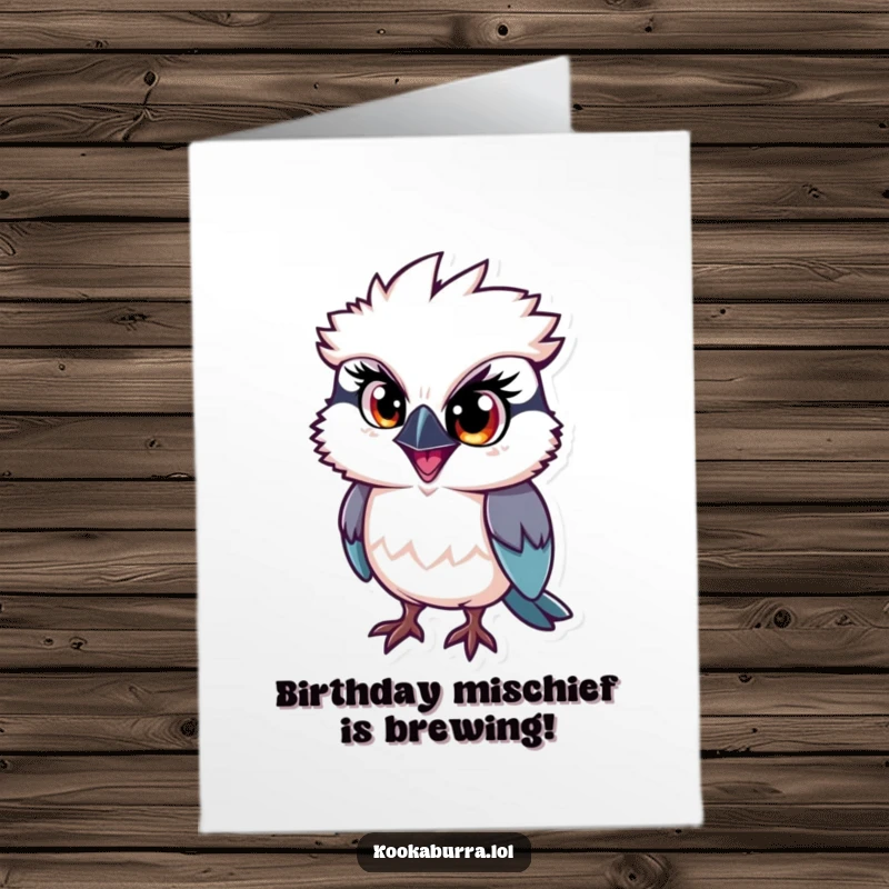 Funny Free Printable Birthday Card: Kookaburra with one big, sparkling eye, radiating pure mischief.
