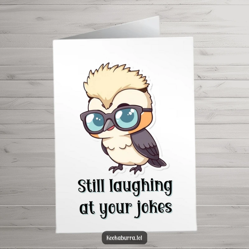 Funny free printable birthday card featuring a kookaburra in oversized glasses, peeking over them with a huge giggle, bringing cheer.