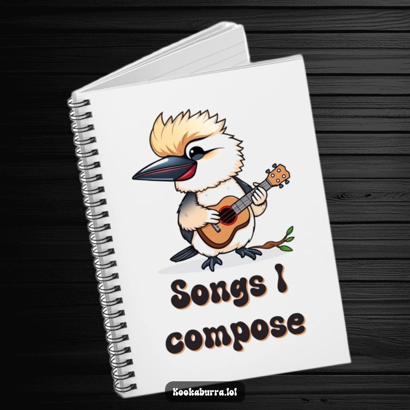 Funny notebook with a kookaburra happily playing a tiny ukulele, perfect for jotting down musical ideas.