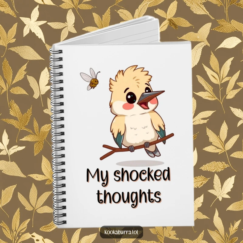 Funny kookaburra making a surprised face as a bug flies past, a humorous notebook for jotting surprises.
