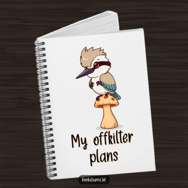 Funny Notebook: A kookaburra bird balances precariously on a small mushroom, perfect for jotting down thoughts.