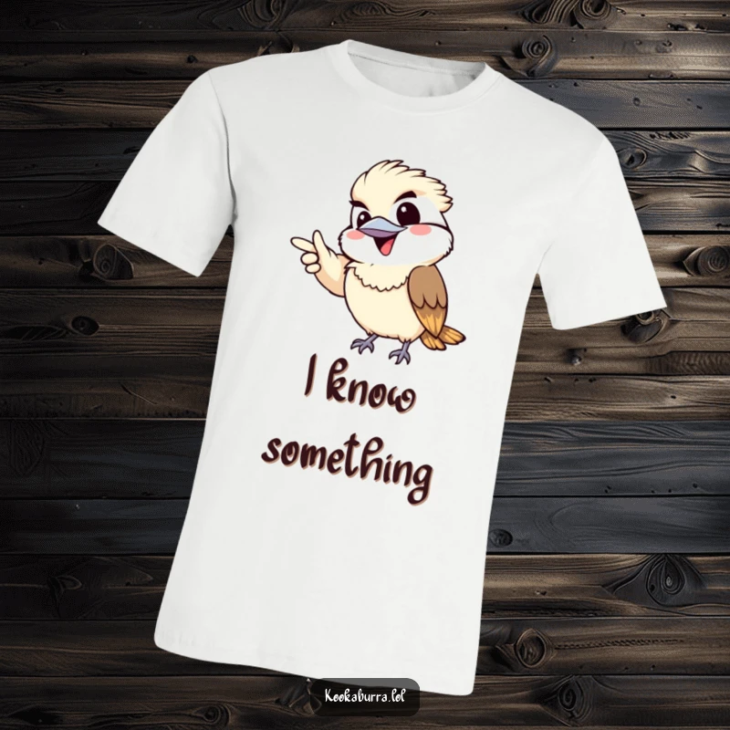 Funny t-shirt showcasing a kawaii kookaburra pointing gleefully with a wide, mischievous grin, looking cheeky and playful.
