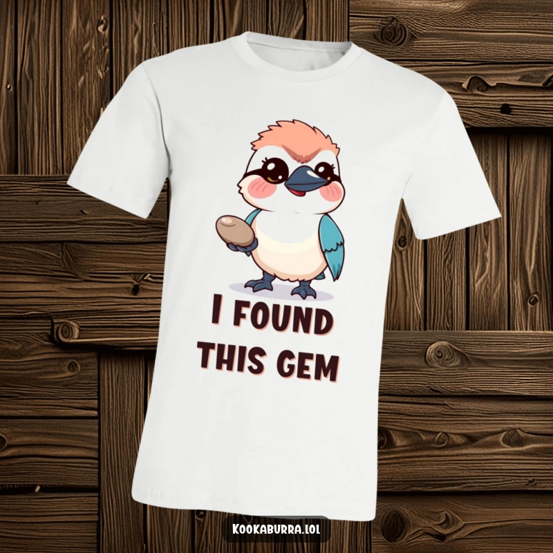 Funny T-Shirt: A comical kookaburra bird proudly presents a shiny pebble with a hopeful, expectant look.