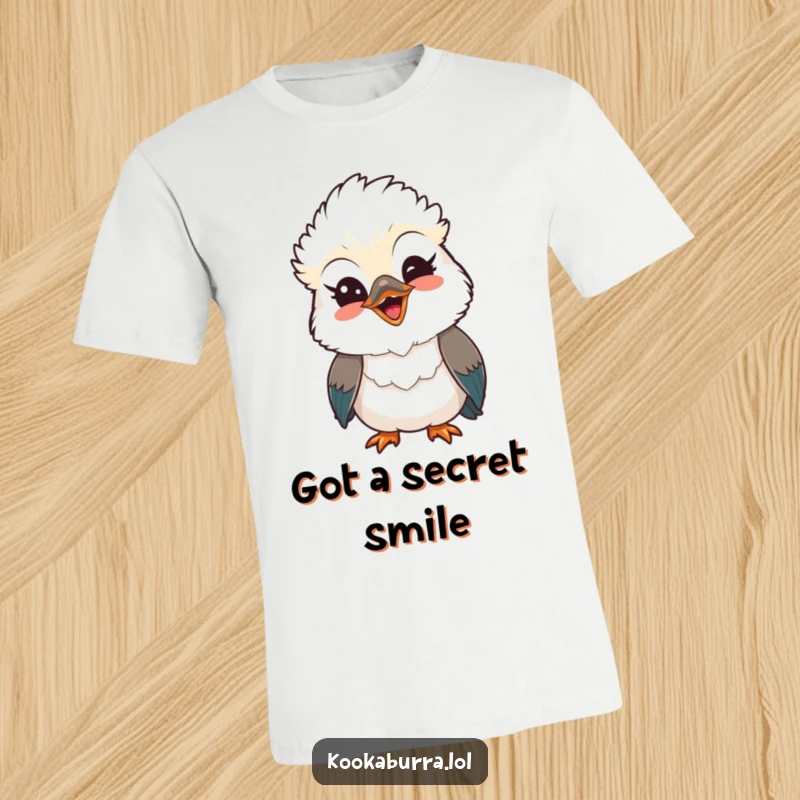 Funny Kawaii Kookaburra t-shirt, a cute bird giving a playful wink and a wide beaming smile. Perfect for spreading joy and funny gifts.