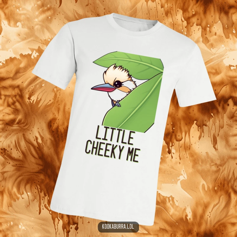 Funny t-shirt showcasing a kookaburra peeking from behind a giant leaf, giving a sly, mischievous wink.