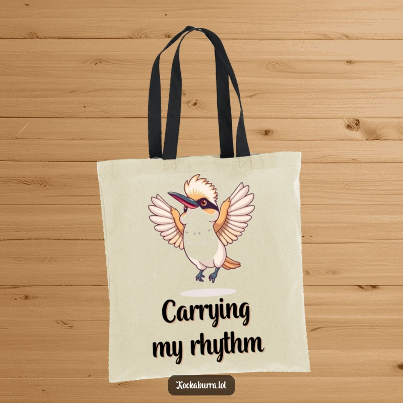 Funny tote bag showcasing a kookaburra energetically dancing with its wings spread wide, embodying infectious laughter and playful spirit.