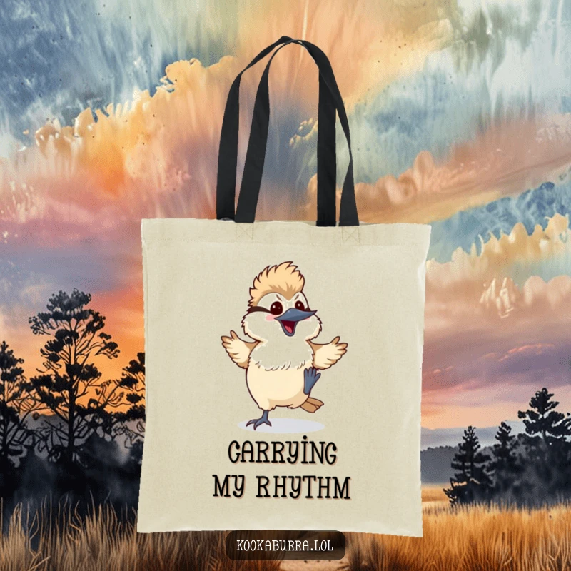 Funny kawaii kookaburra tote bag showing a bird doing a silly dance with its feet kicking up, a comical and energetic accessory.