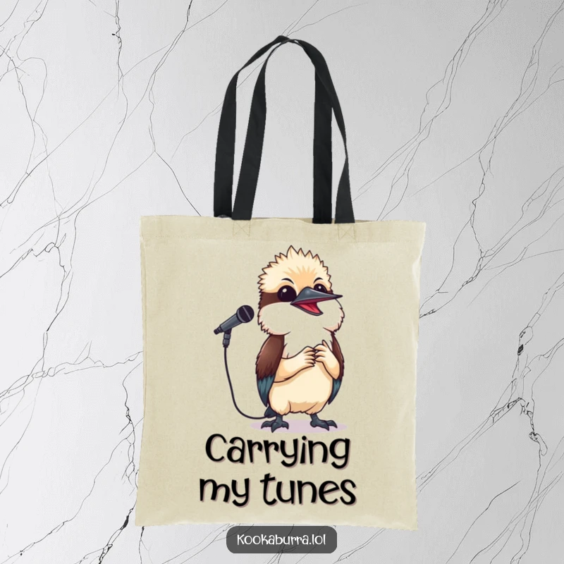 Funny kookaburra tote bag showing a small bird holding a microphone and singing joyfully, perfect for carrying music gear.