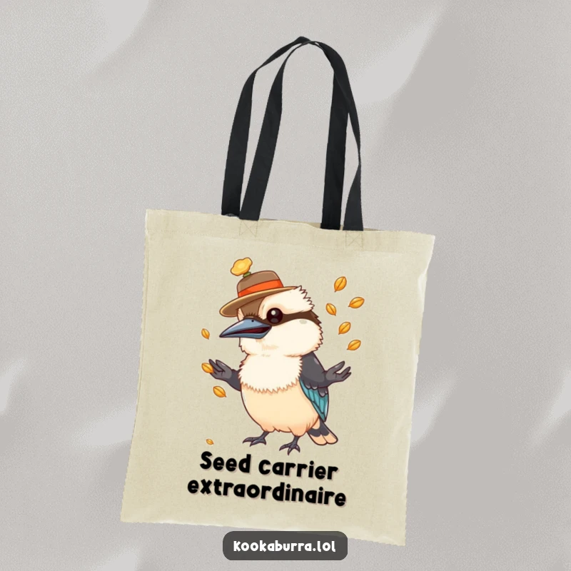 Funny kookaburra tote bag showing a bird with a hat juggling shiny seeds, practical and amusing.